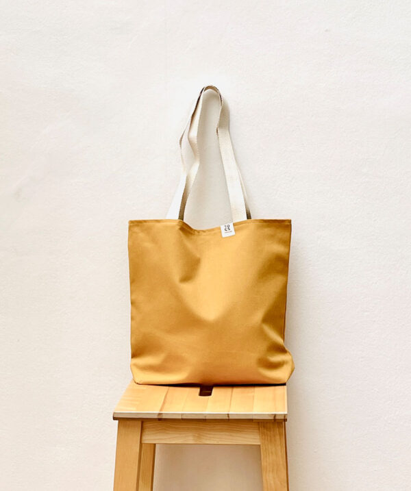 Bolso totebag mostaza de TOCS